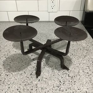 Black wrought iron candlebras Each one holds 4 candles. Have 2 of them.